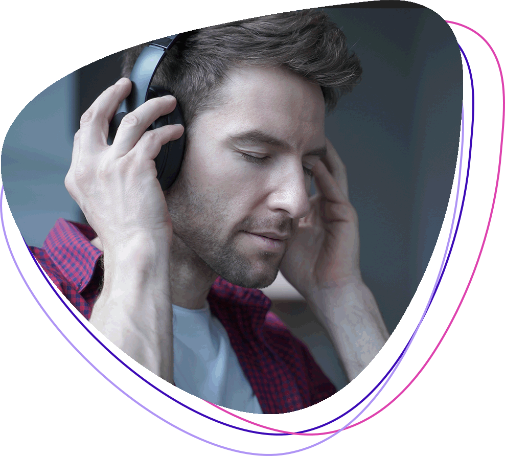 Image of man listening delta frequency range with headphone 